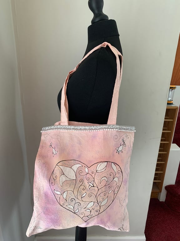 Tie dyed and had painted tote bag with filigree heart design 