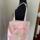 Tie dyed and had painted tote bag with filigree heart design 