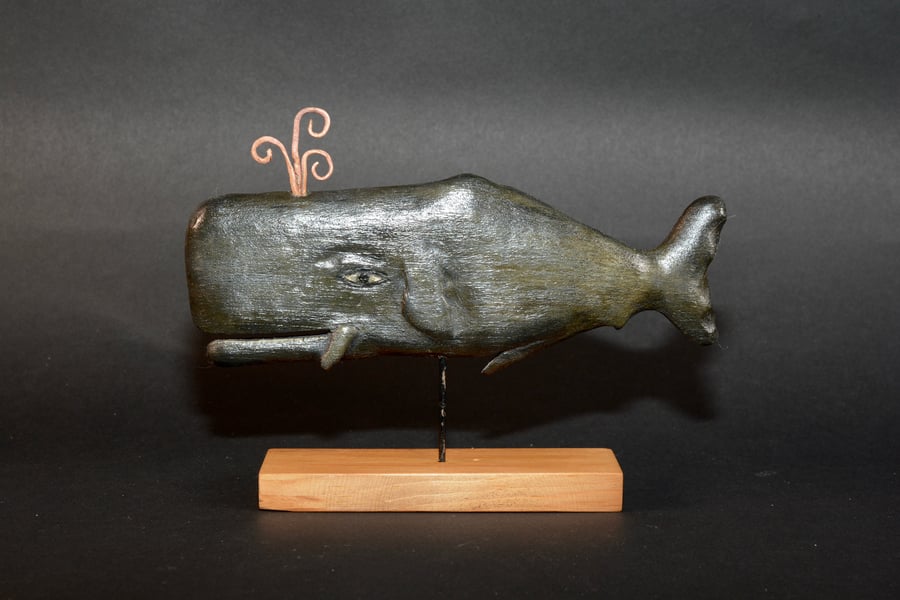 Hand carved whale sculpture 