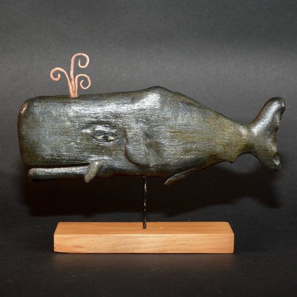 Hand carved whale sculpture 