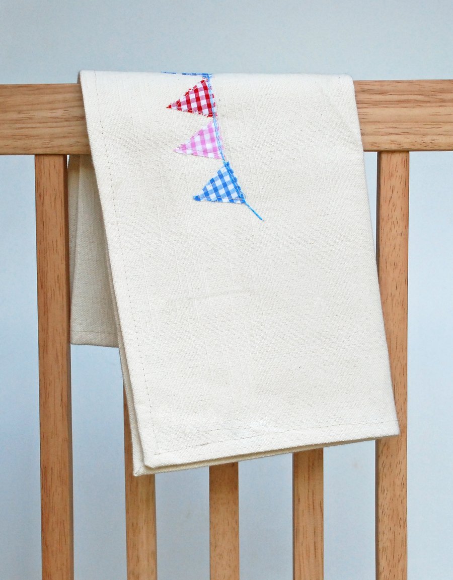 Cotton tea towel with appliqued bunting