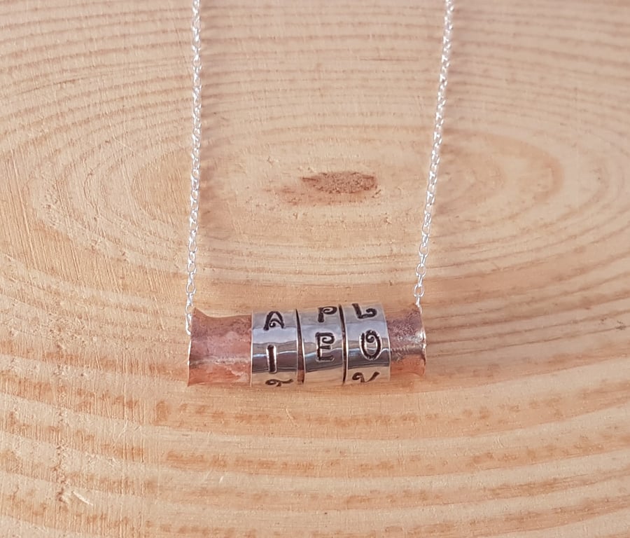 Sterling Silver and Copper 'Faith Hope Love' Spinner Necklace