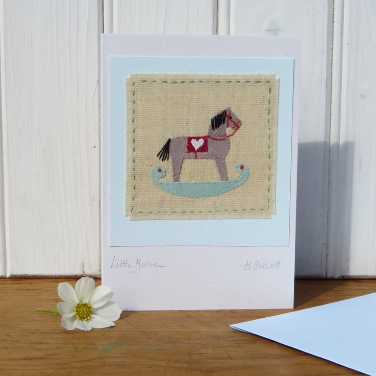 Hand-stitched rocking horse applique mounted on card - lots of detail, to frame?