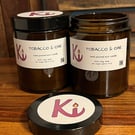 Tobacco & Oak scented soy candle in an apothecary jar