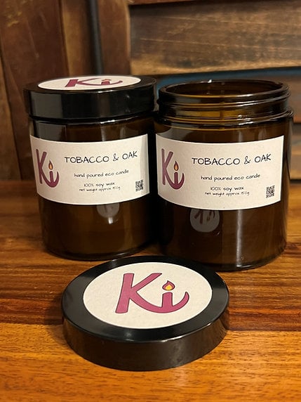 Tobacco & Oak scented soy candle in an apothecary jar