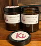 Tobacco & Oak scented soy candle in an apothecary jar
