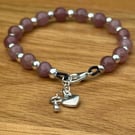 Beaded gemstone bracelet with double charm extension chain 