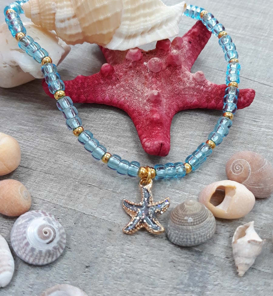 AL38 Blue and gold beaded anklet with Starfish