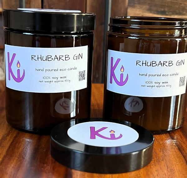 Rhubarb Gin scented soy candle in an apothecary jar