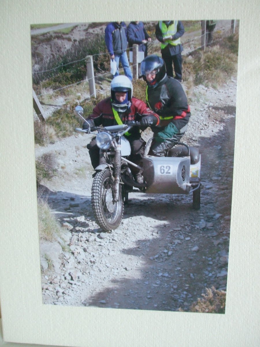 Photographic greetings card of a motorbike and sidecar on the Lands End Trial.