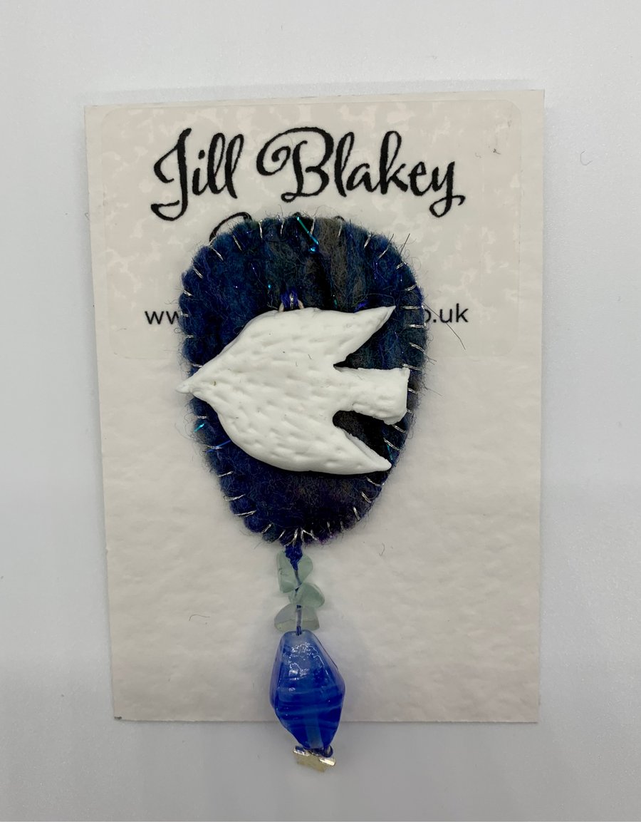 White bird brooch 