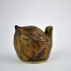 Ceramic wren,  bronze glaze