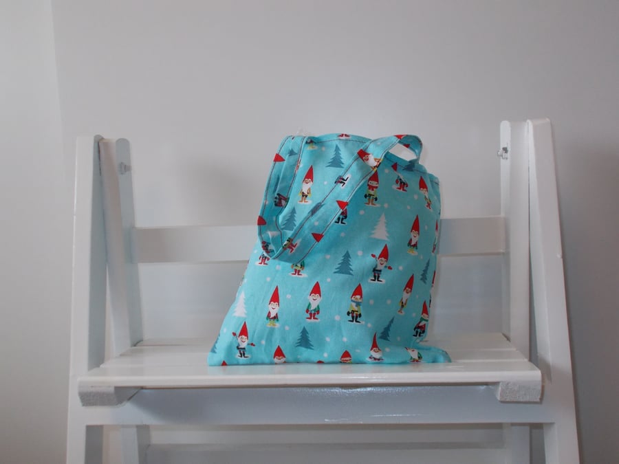 Mini Christmas present bag printed with little Christmas elfs