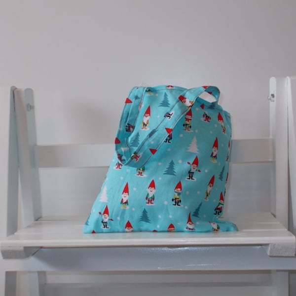 Mini Christmas present bag printed with little Christmas elfs