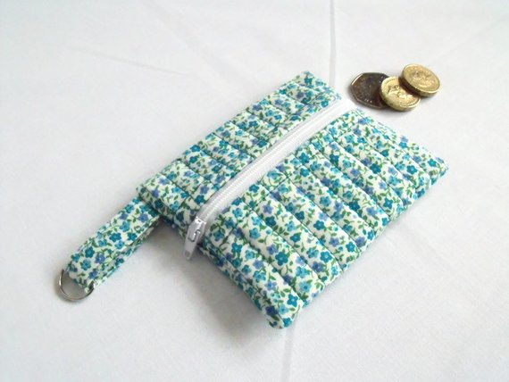 turquoise ditsy print zipped coin purse with D ring attached