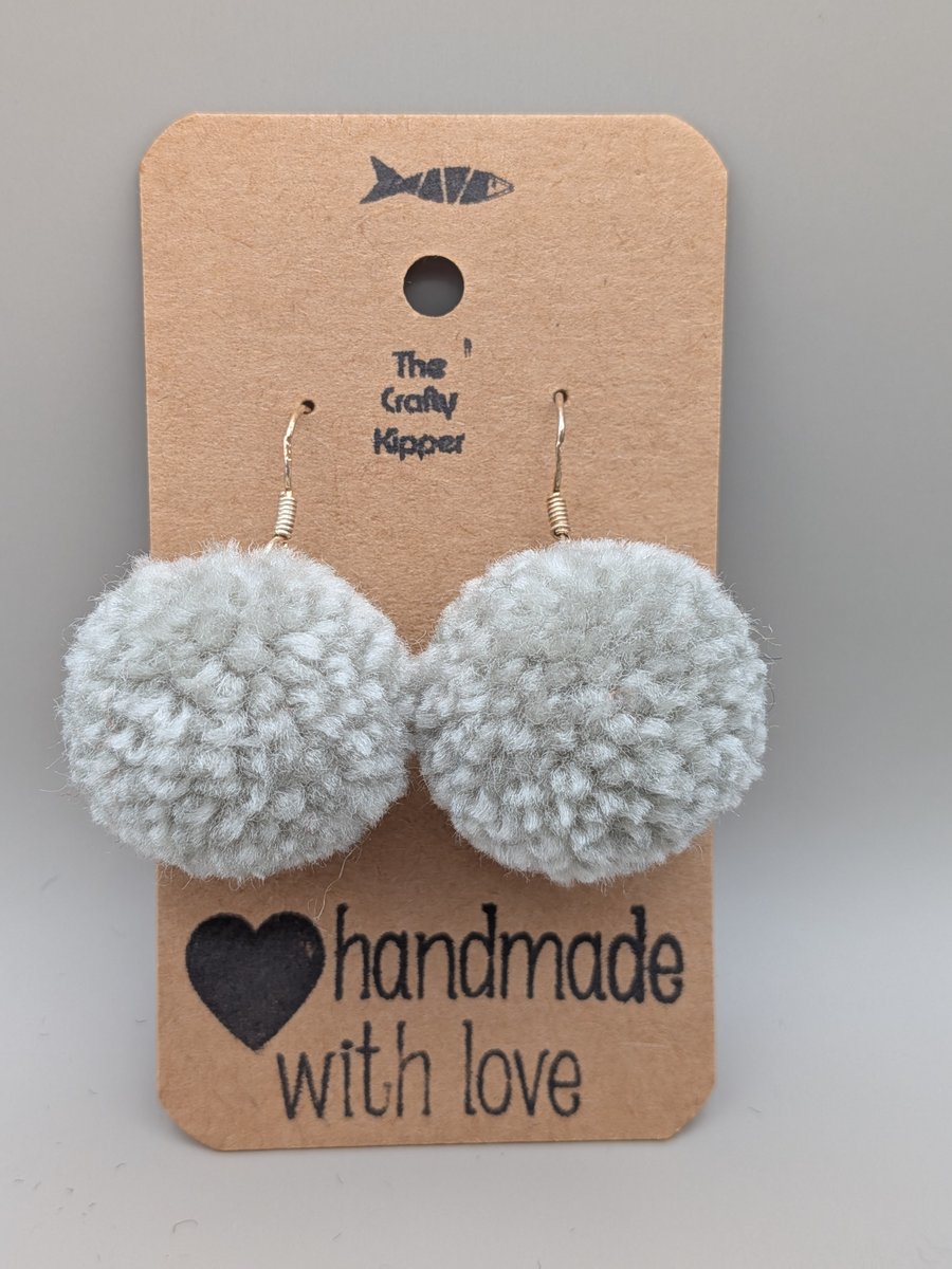 Handmade pom pom earrings.