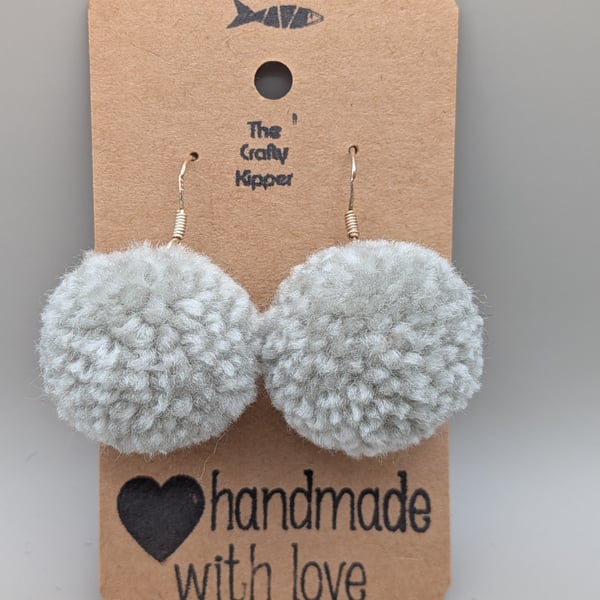 Handmade pom pom earrings.