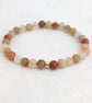 Frosted golden jade gemstone stretch bracelet  - Image 6