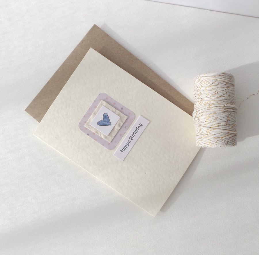 Simple Birthday Card, Blue Heart, Says Happy Birthday.