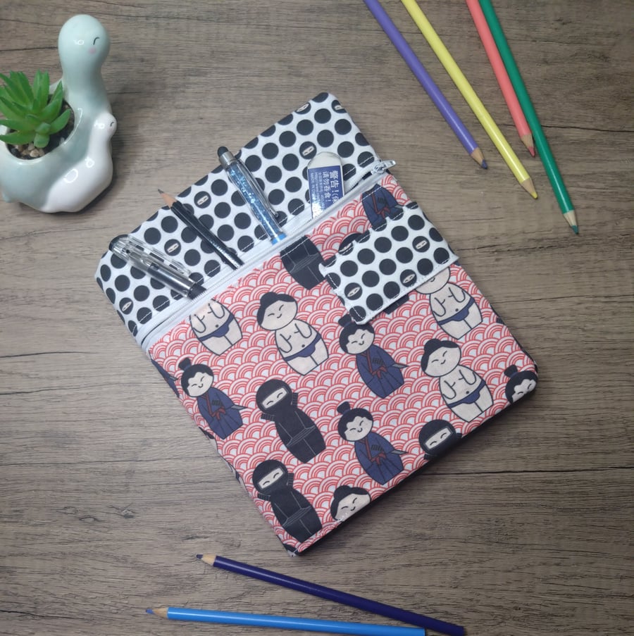 A5 sketchbook or notebook with fabric cover, fighter kokeshi doll design