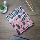 A5 sketchbook or notebook with fabric cover, fighter kokeshi doll design