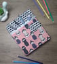 A5 sketchbook or notebook with fabric cover, fighter kokeshi doll design - Image 1