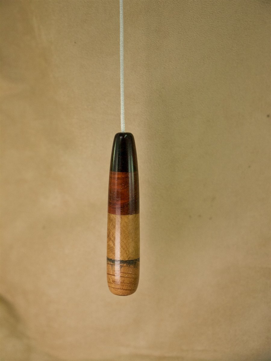 Unique hand made wood light pull pendant. LP04