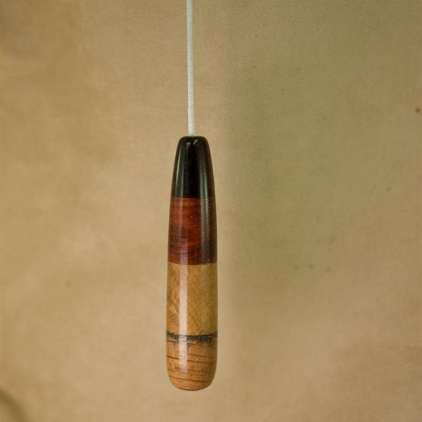 Unique hand made wood light pull pendant. LP04