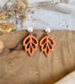 Autumn Minimalist Cutout Metallic Orange Polymer Clay Leaf Earrings - Image 9