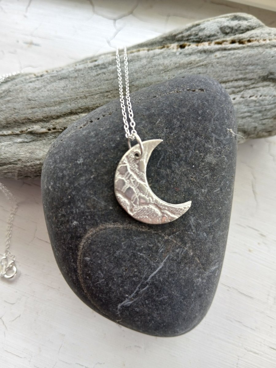 Silver moon pendant made from silver clay