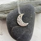 Silver moon pendant made from silver clay
