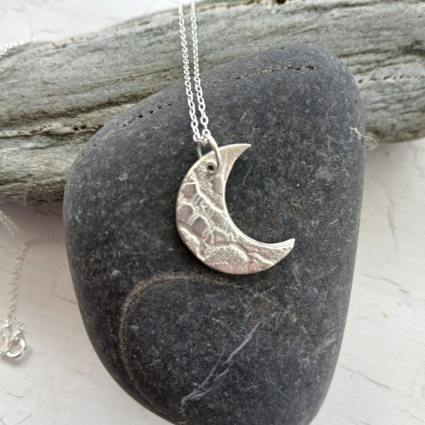 Silver moon pendant made from silver clay