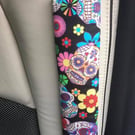 Funky Skulls Reading Car seat belt Pad