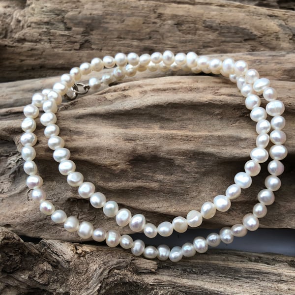 4-5mm white freshwater pearls with sterling silver fastener -00001050