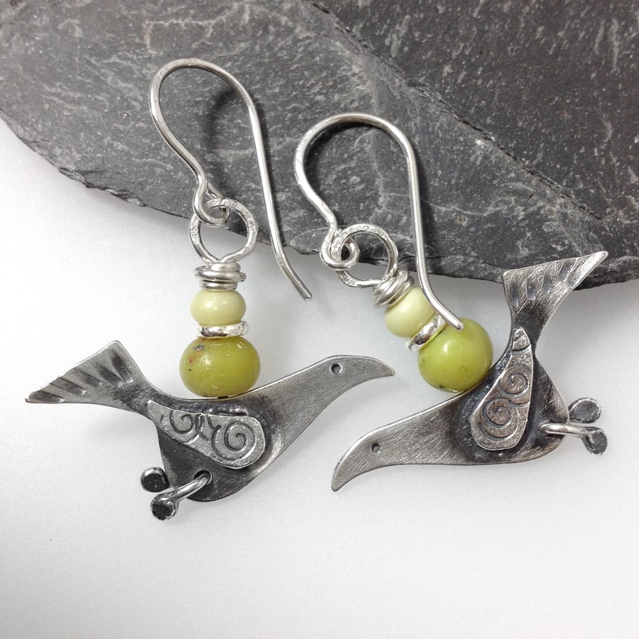 silver song bird earrings with serpentine and butter jade beads