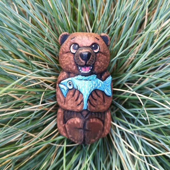 Hand carved and painted Biscuit Bumblepaws the fishing bear