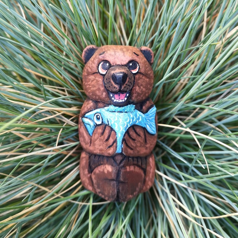 Hand carved and painted Biscuit Bumblepaws the fishing bear