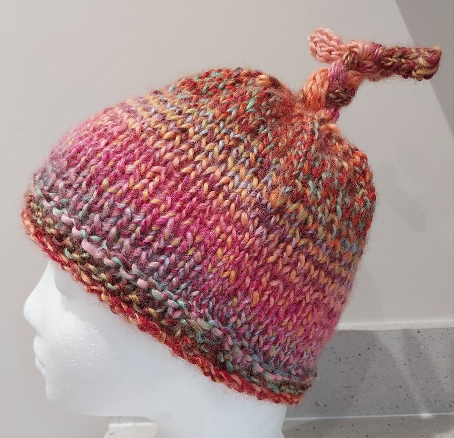 Handknit Children's Tie Top Beanie. Bright multi