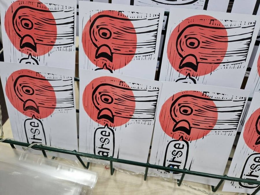 Arse bird. Lino print postcard.