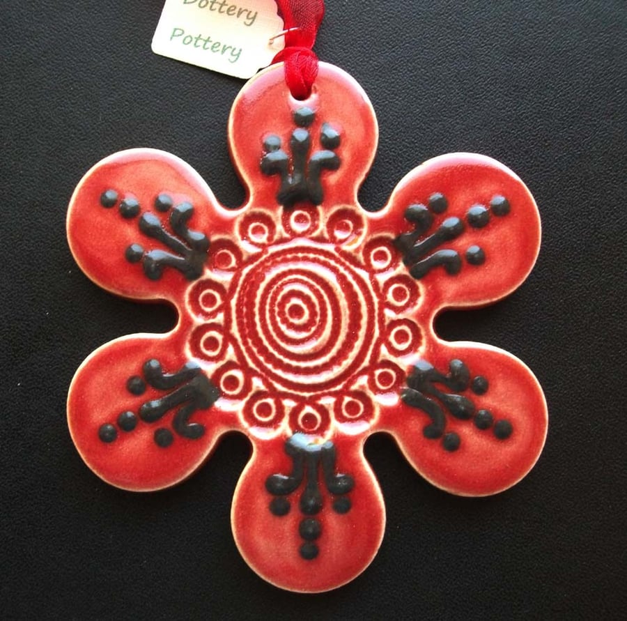Bright ceramic flower decoration.