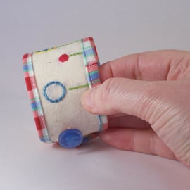 Hand embroidered fabric cuff