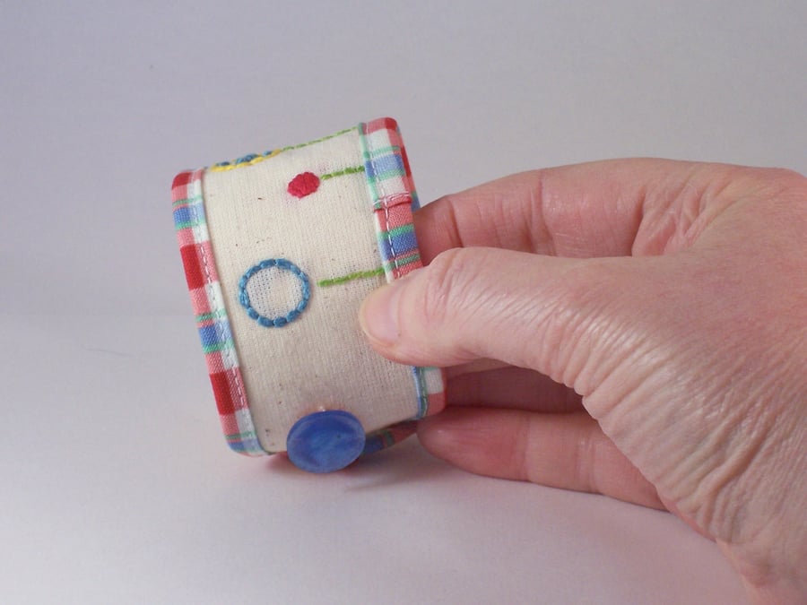 Hand embroidered fabric cuff