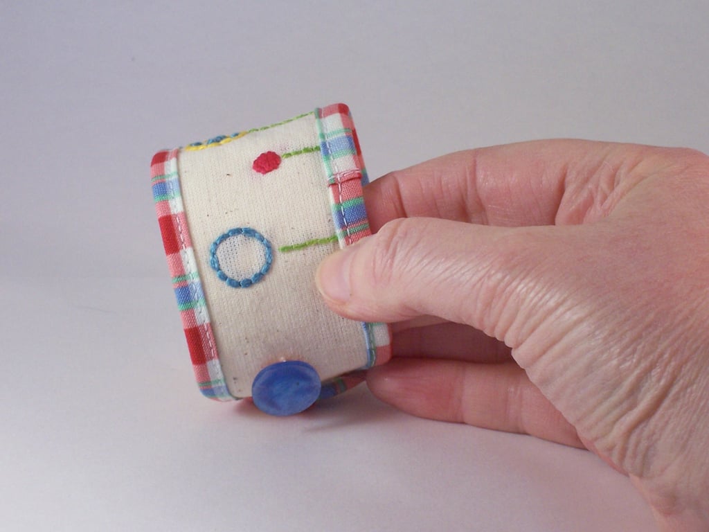 Hand embroidered fabric cuff