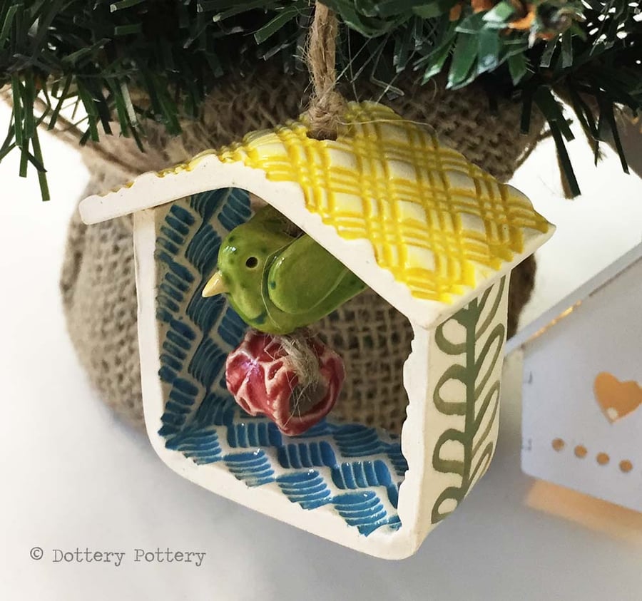 Small decorative pottery birdhouse hanging decoration with ceramic bird and bead