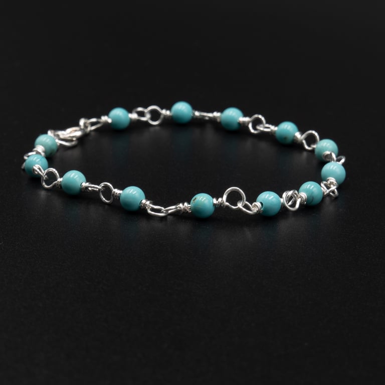Turquoise blue Howlite and silver handmade link bracelet.