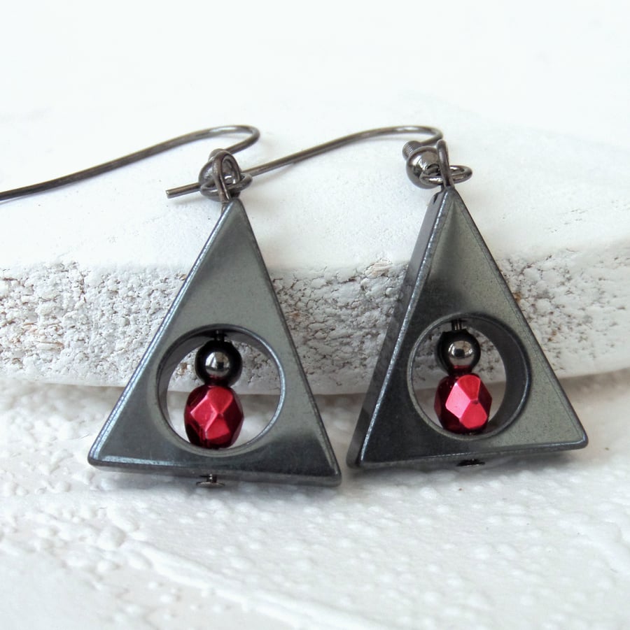 Triangle hematite earrings with red crystal