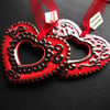 Set of two Red ceramic folk art style hearts