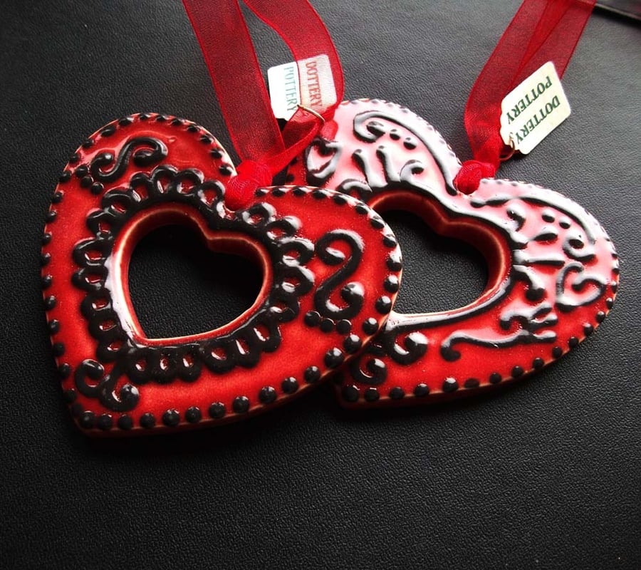 Set of two Red ceramic folk art style hearts