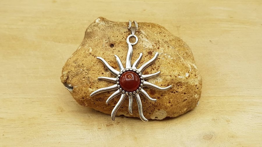Red Carnelian sunburst pendant. July birthstone. 17th anniversary gemstone