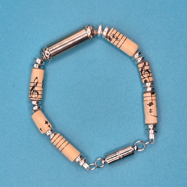 One of a kind paper beaded bracelet made with vintage music paper